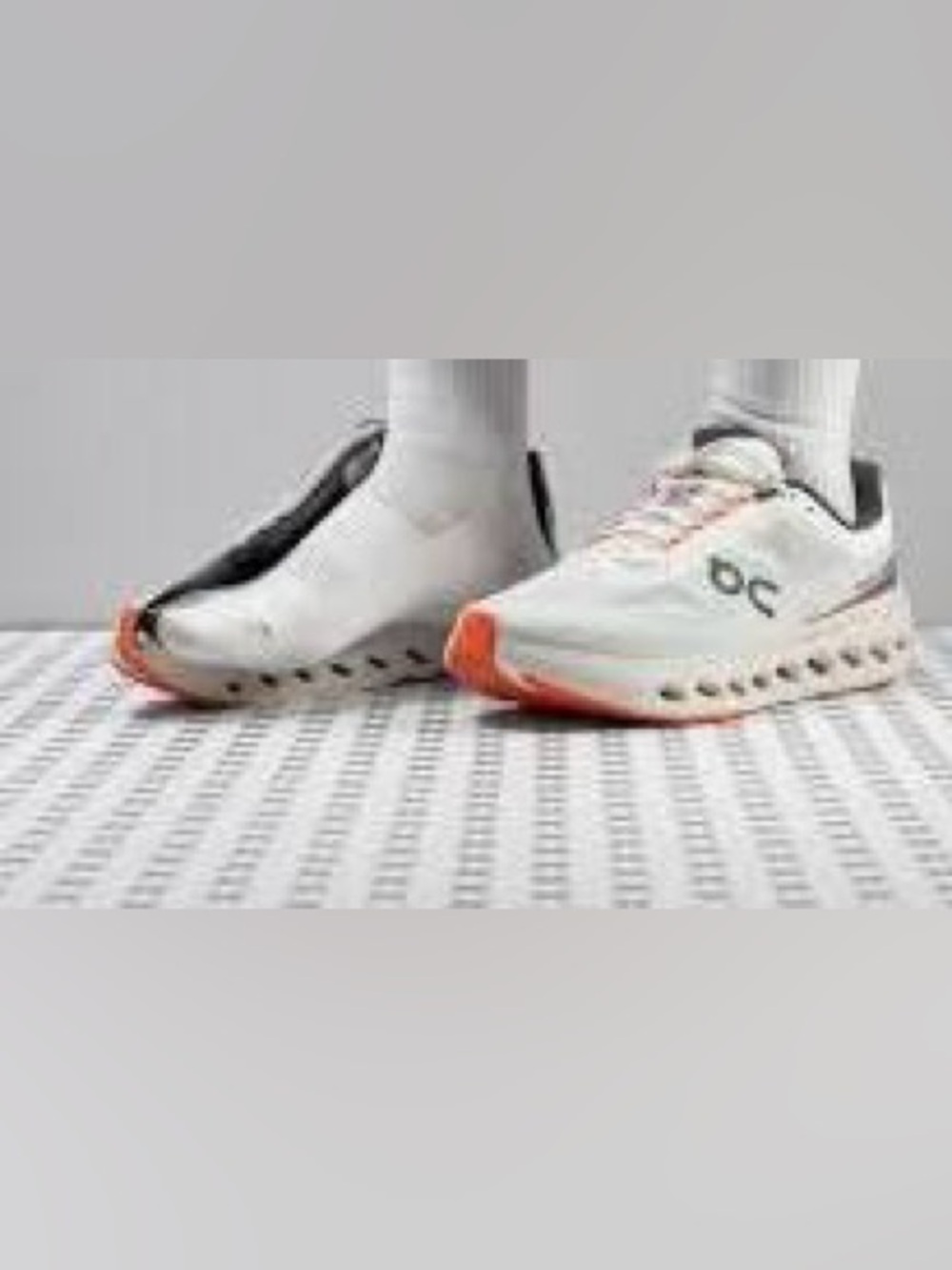 On Running Cloudrunner Athletic Shoes in White with Coral Accents